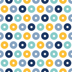 Seamless pattern with yellow and blue circles