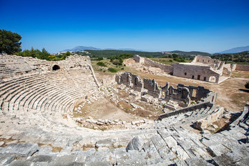 Patara (Pttra). Ruins of the ancient Lycian city Patara. Amphi-theatre and the assembly hall of Lycia public. Patara was at the Lycia (Lycian) League's capital. Aerial view shooting. Antalya, TURKEY