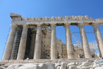 A closeup view of the ancient wonder the Parthenon atop the Acropolis, in Athens, Greece.  The temple is undergoing construction to fix parts of the Parthenon.