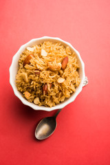 Traditional Jaggery Rice or Gur wale chawal in Hindi, served in a bowl with spoon. selective focus