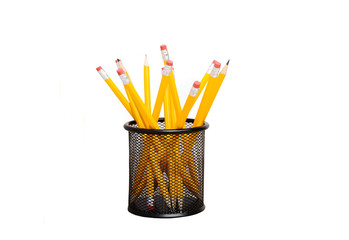 Yellow pencils in cup isolated on white background