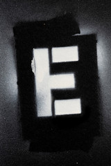 Letter E grunge spray paninted stencil font