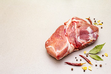 Raw fresh pork shoulder with spices