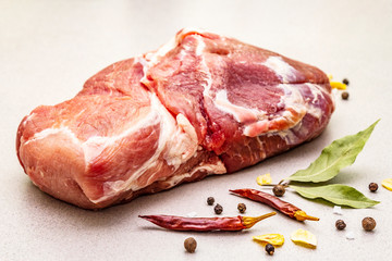 Raw fresh pork shoulder with spices