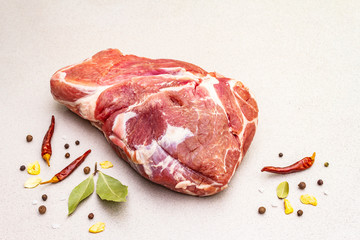 Raw fresh pork shoulder with spices
