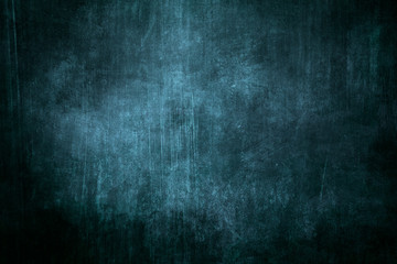 Dark blue grungy background or texture