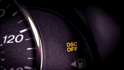 Close-up dashboard with DSC OFF warning light on
