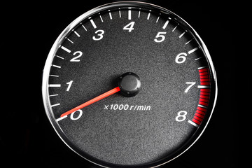 Close-up dashboard with speedometer and RPM