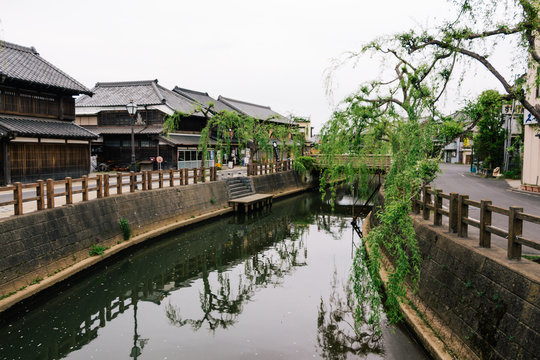 Old vintage wooden Japanese house along small street by Tonegawa river in Sawara village, famous little Edo old town.