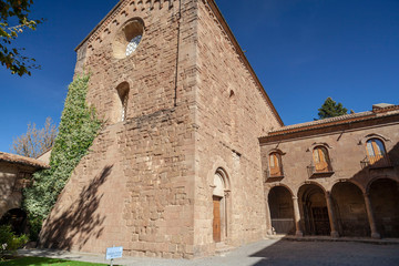 Fototapeta na wymiar Sant Joan de les Abadesses, Catalonia, Spain. Exterior view of Monastery of Sant Joan, romanesque and gothic style.