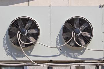 fans from air conditioners installed on the street