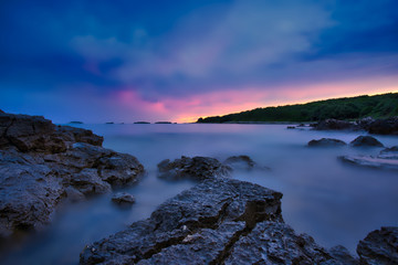 Vestar beach rocks in Croatia after sunset