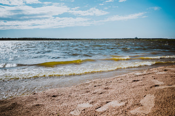  sandy beach in summer on the lake
