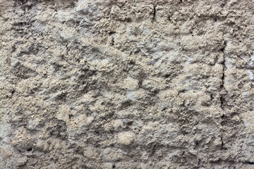 Grey stucco grungy wall surface 