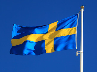 Sweden flag waving with the blue sky on the background