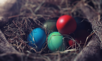 Easter painted eggs on burlap
