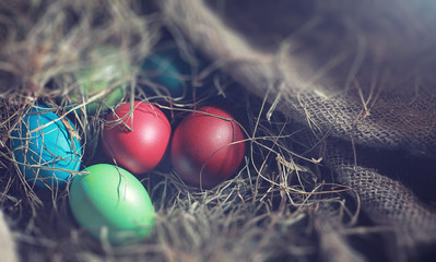 Easter painted eggs on burlap