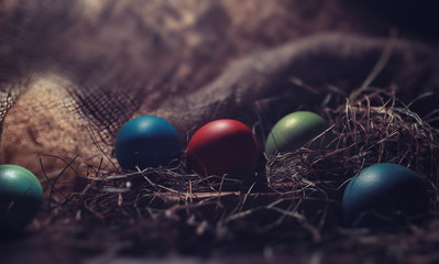 Easter painted eggs on burlap
