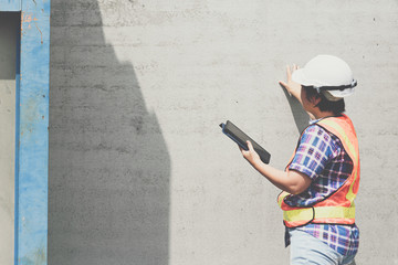 Woman construction engineer at construction site