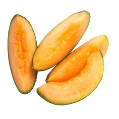 heap of slices of cantaloupe isolated on white background. top view