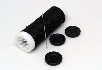 spool of thread and needle