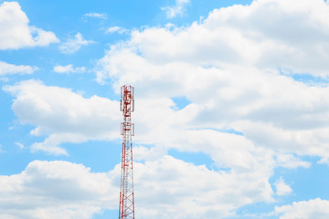 Industrial background. Aerial of cellular mobile phone, tv, internet and radio tower against the blue sky with copy space