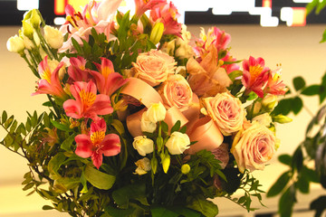 A beautiful bouquet of flowers stands in a vase