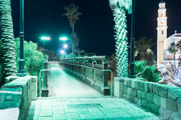 The Wishing Bridge in the green light of a spotlight located on old city Yafo in Tel Aviv-Yafo in Israel