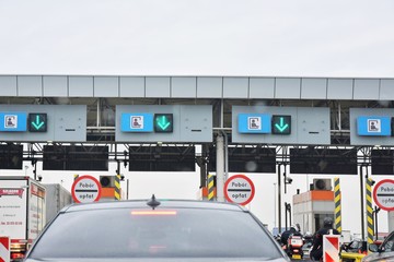 Traffic jam at the point of payment for the toll road. Toll highway. Point of payment on the road