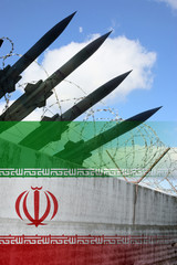 Military rockets, wall with barbwire and  Iran national flag