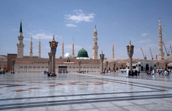 Muslims wearing traditional clothing in the temple of the Nabawi Mosque