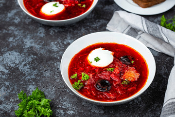 Traditional borscht with prunes and sour cream