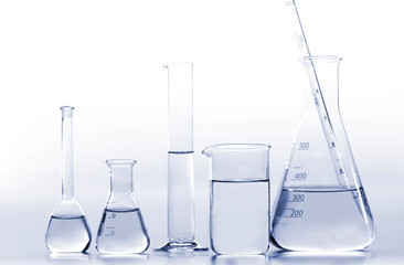 Test-tubes on a white and blue background.