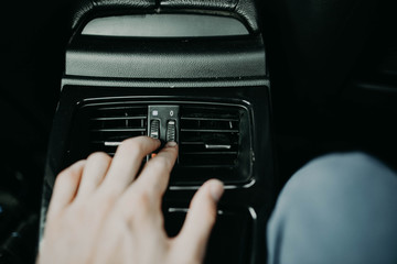 control of air conditioning in the car for the rear seat passengers.