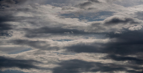 Obraz premium Beautiful dark rain clouds. Nature background.