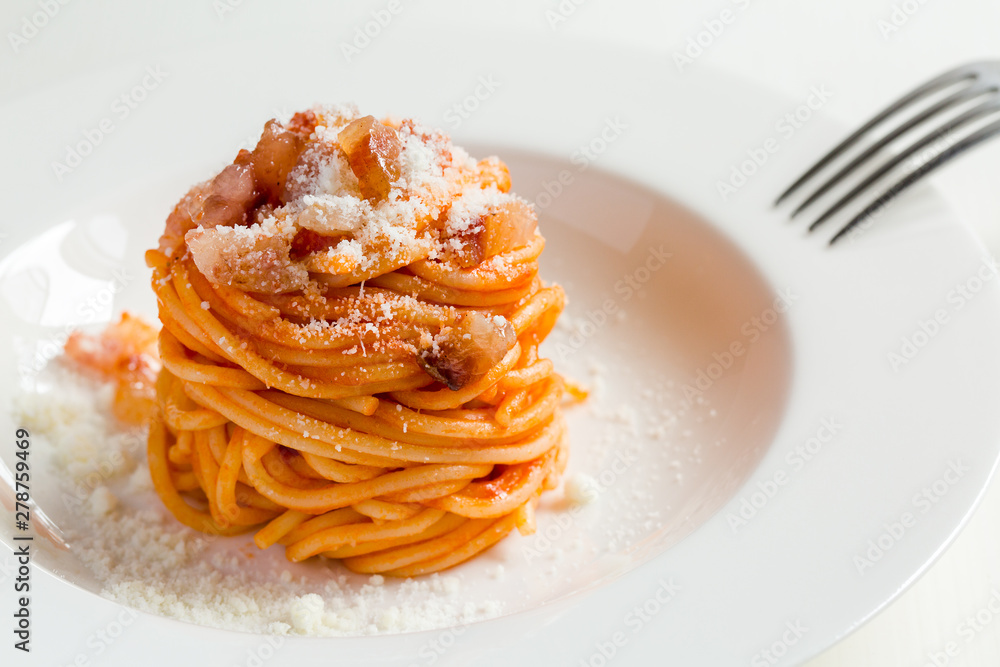 Poster Homemade Amatriciana - Italian pasta based on guanciale (cured pork cheek), pecorino cheese, tomato, white wine,  olive oil. Cucina romana tradizionale. Original recipe fixed by Comune di Amatrice.