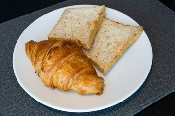 bread&croissant on a plate