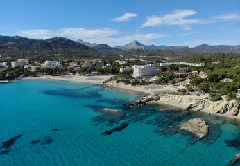 Fototapeta na wymiar Aerial distant waterside view Peguera beach, Palma de Mallorca, Spain