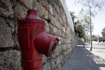 Fototapeta na wymiar Sad hydrant waiting for the work