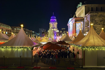 Fototapeta premium WeihnachtsZauber Gendarmenmarkt (Christmas Market at Gendarmenmarkt) in Berlin in night, Germany. This is the one of the most popular and amazing Christmas markets of Berlin.