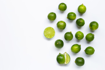 Fresh limes isolated on white background.