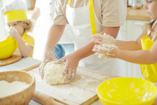 Culinary Master Class. Children in the kitchen are cooking. 