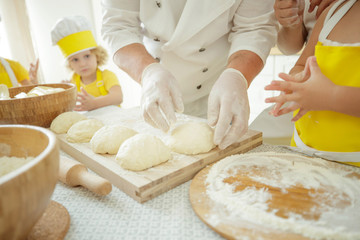 Culinary Master Class. Children in the kitchen are cooking. 