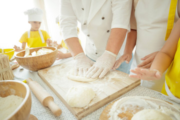 Culinary Master Class. Children in the kitchen are cooking. 