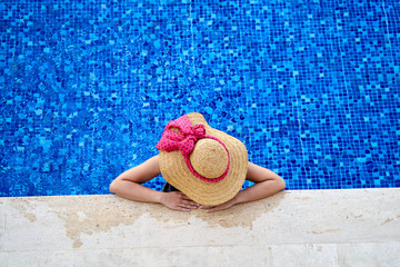 a woman in the relaxing pool