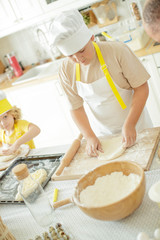 Obraz na płótnie Canvas Culinary Master Class. Children in the kitchen are cooking. 