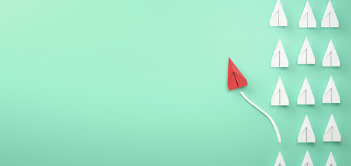 paper plane leadership concept - red paper plane leading the row © Studio_East
