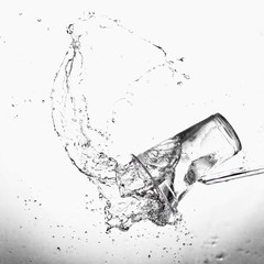 water splash in glass isolated on white background