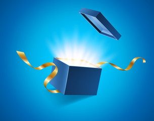 Blue opened 3d realistic gift box with magical shining glow and golden ribbons flying off cover, place for your text vector illustration