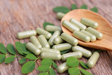 Herbal powder medicine in capsules, alternative supplement for good healthy lifestyle